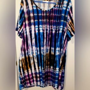 Bright Colorful Long Shirt. The material is super soft and stretchy.
